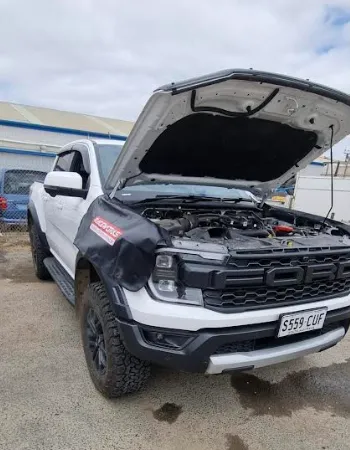 car with open hood