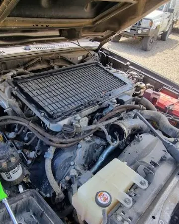 car with open hood