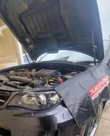car with open hood