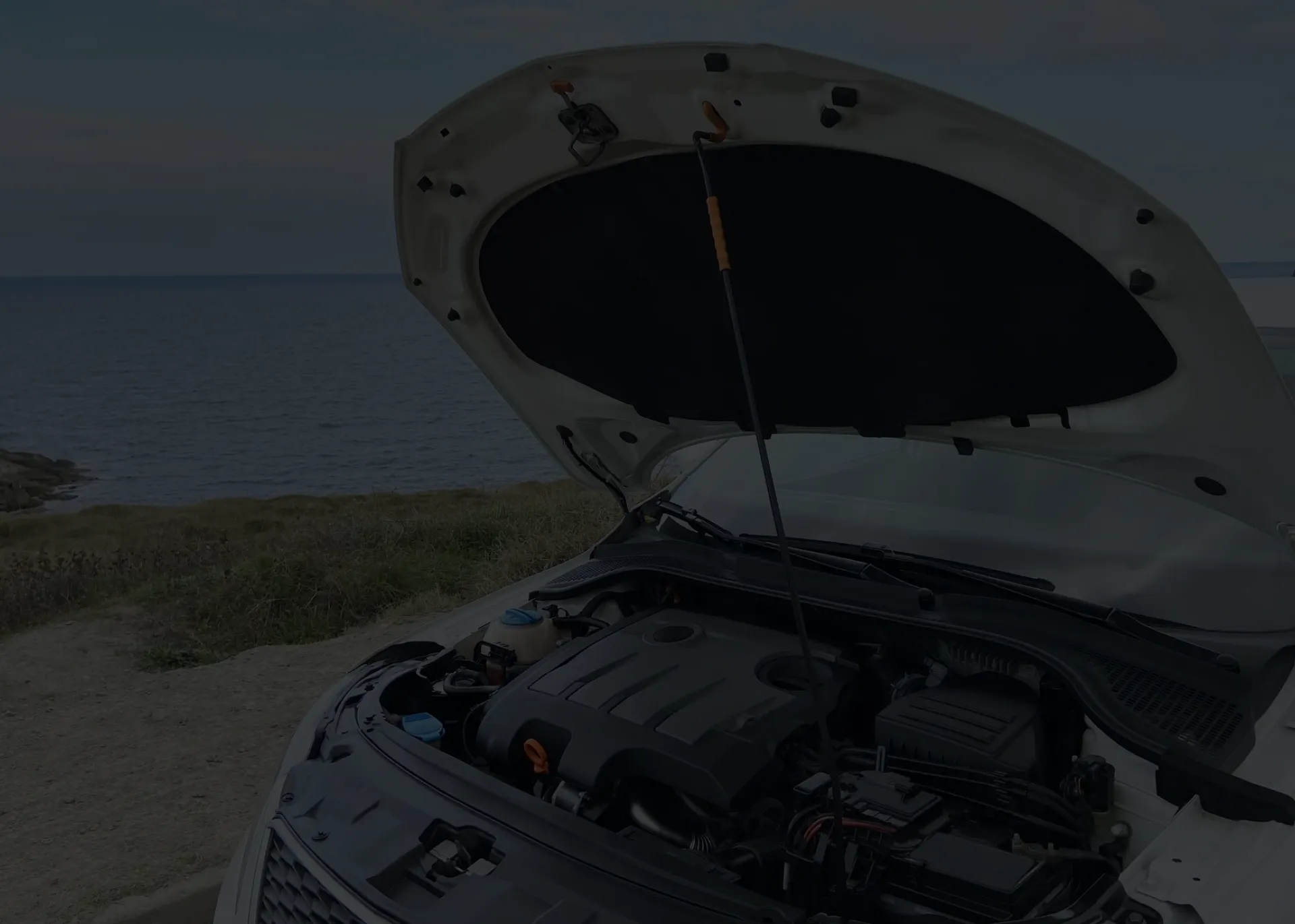 car with open hood