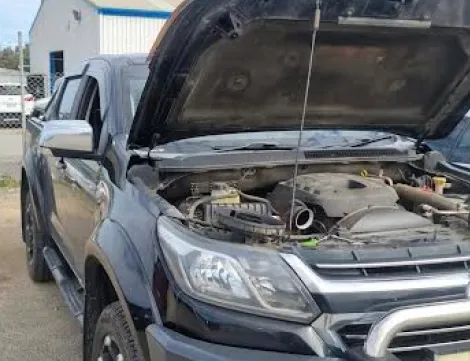 car with open hood